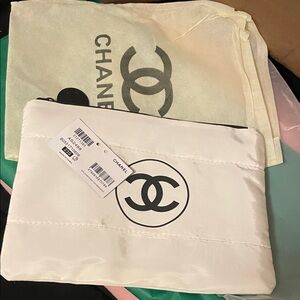 VIP/GWP Ivory Pouch with Iconic Emblem